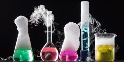 Colourful chemistry equipment on a black background